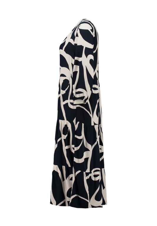 ZB Emira-jurk navy met abstract patroon, lange mouwen en losse vallende rok