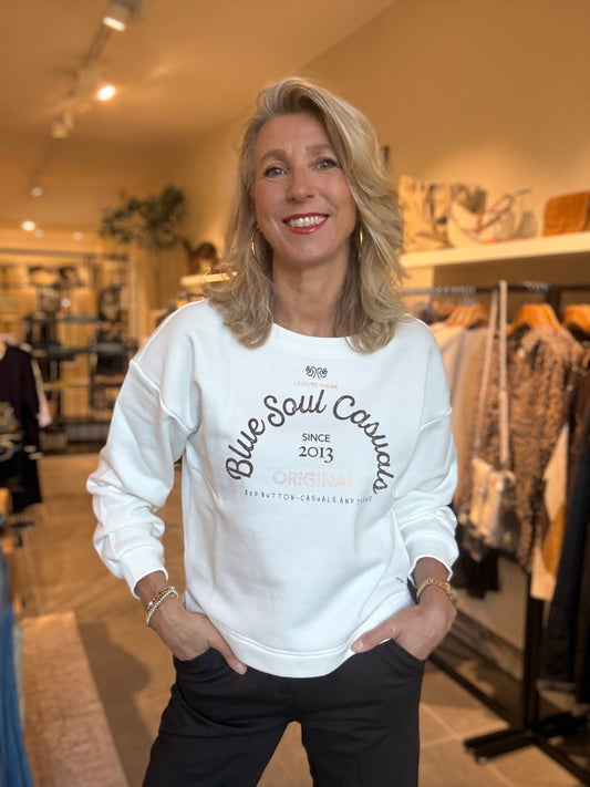 Ecru sweattrui met ronde hals en borstprint, lange mouwen