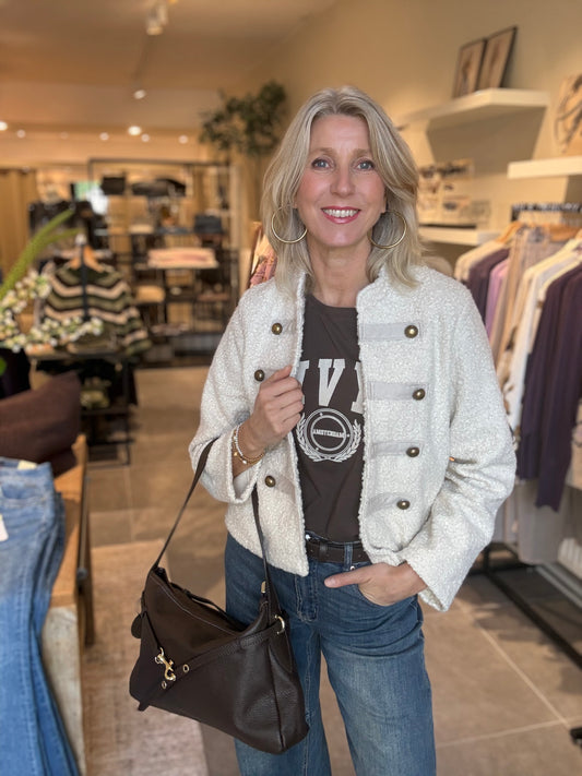 Beige jack met knopen en opgestikte zakken