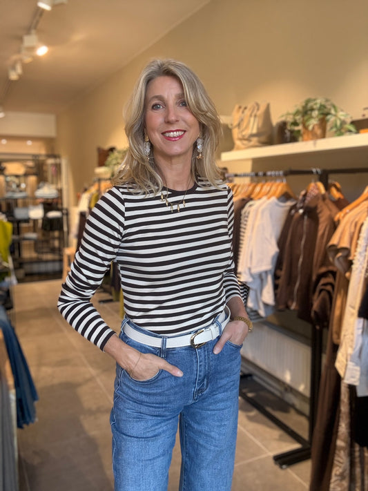 Freequent gestreepte top met ronde hals en lange mouwen, zwart-wit strepen.