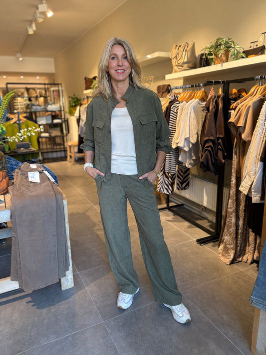 Donkergroene wijde broek met hoge taille en losvallende, wijde pijpen