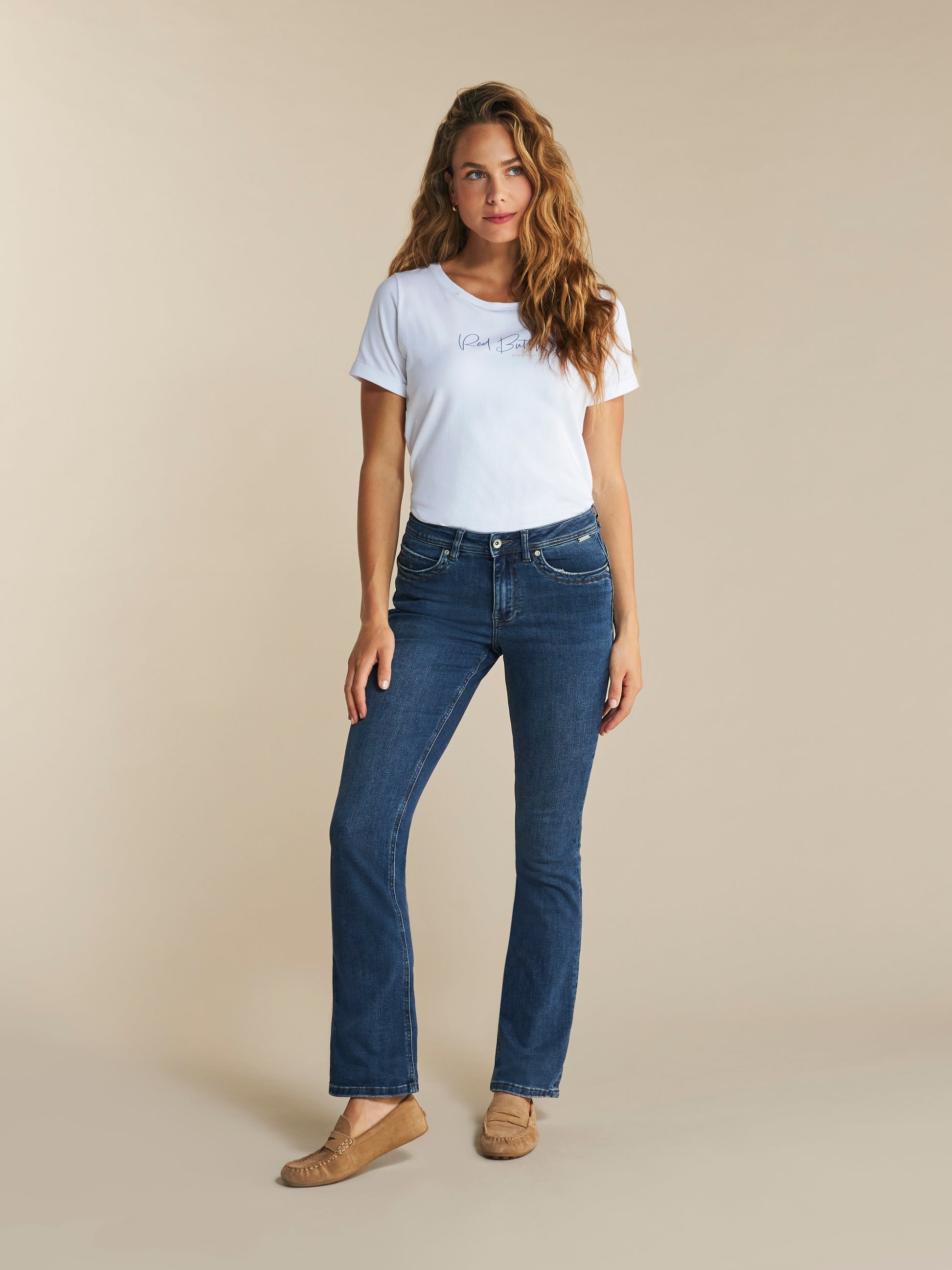 Donkerblauwe bell-bottom jeans met knoop- en ritssluiting, voorzakken en riemlussen